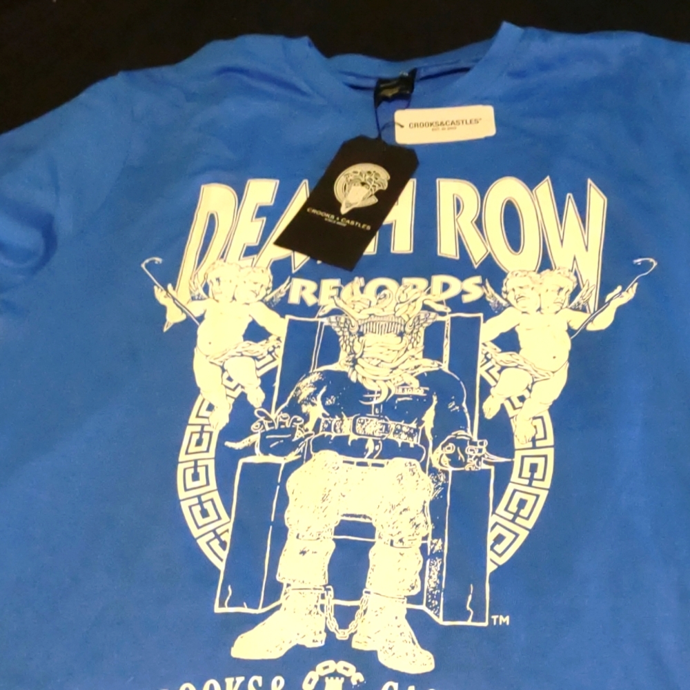 For sale: A royal blue Crooks and Castle Death Row Records tshirt size small